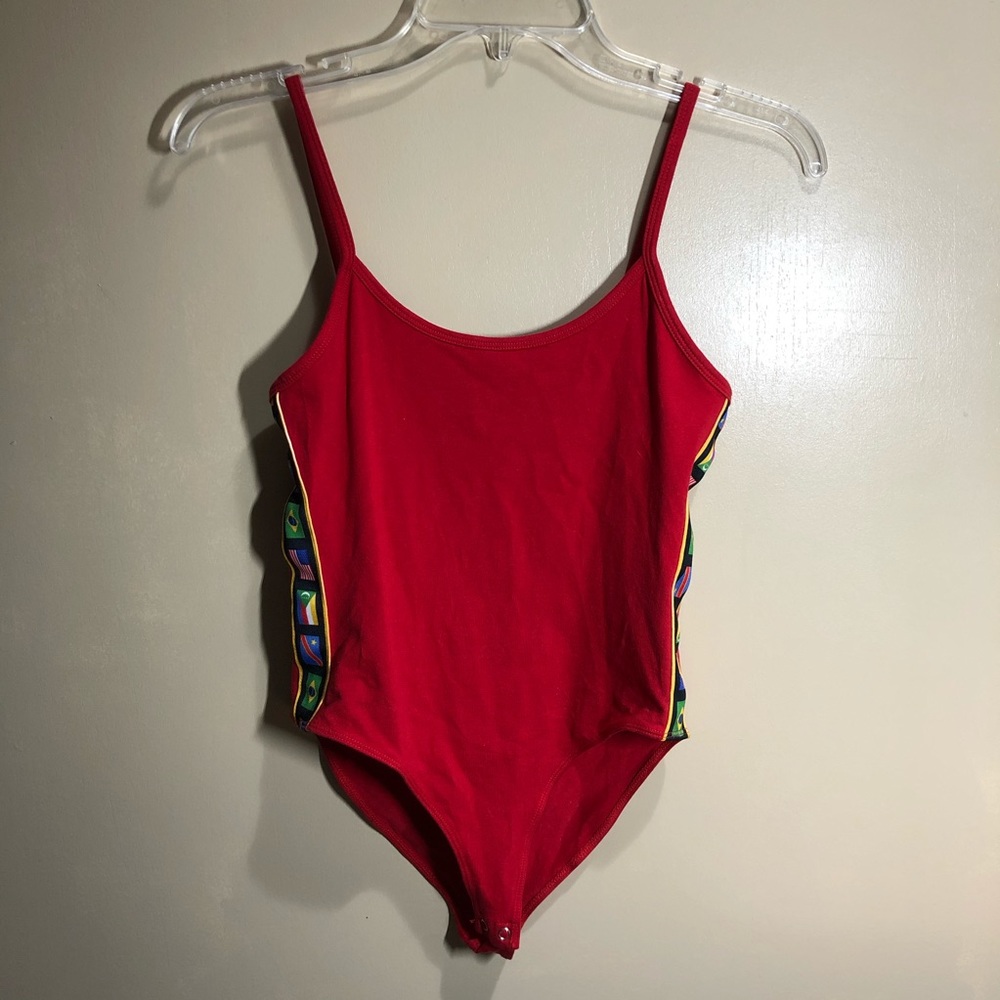 red tank bodysuit with flag graphic on the sides